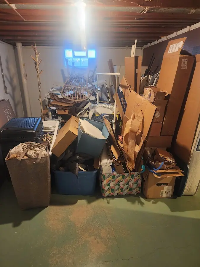 Roll-off dumpster container at job site for 2 Yard Dumpster Rental in Laurel Bay